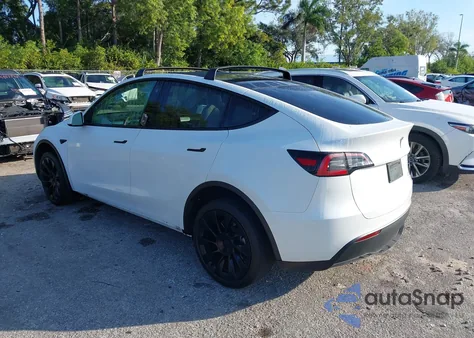 2023 Tesla Model Y Awd/Long Range Dual Motor All-Wheel Drive from USA, damaged, VIN 7SAYGAEE2PF640590